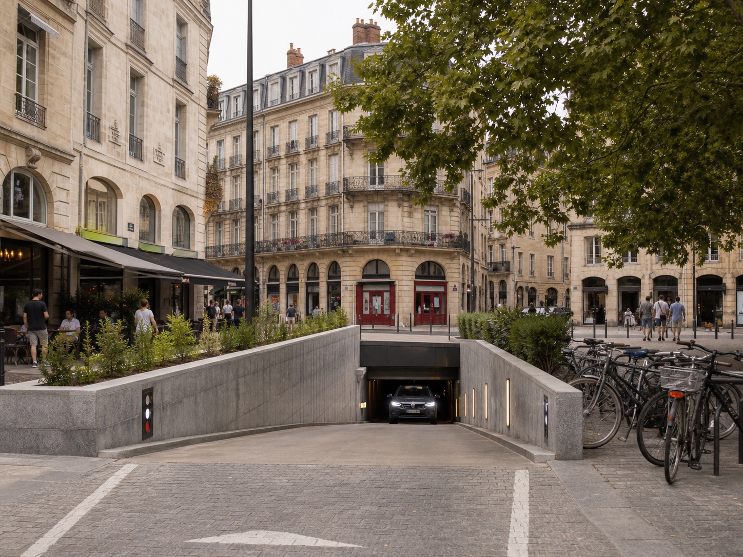 A city-centre underground parking entrance in a busy European district